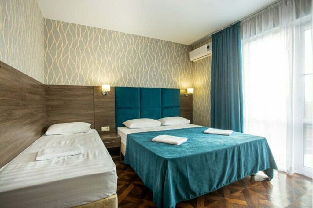 Атмосфера — Трёхместный номер стандарт