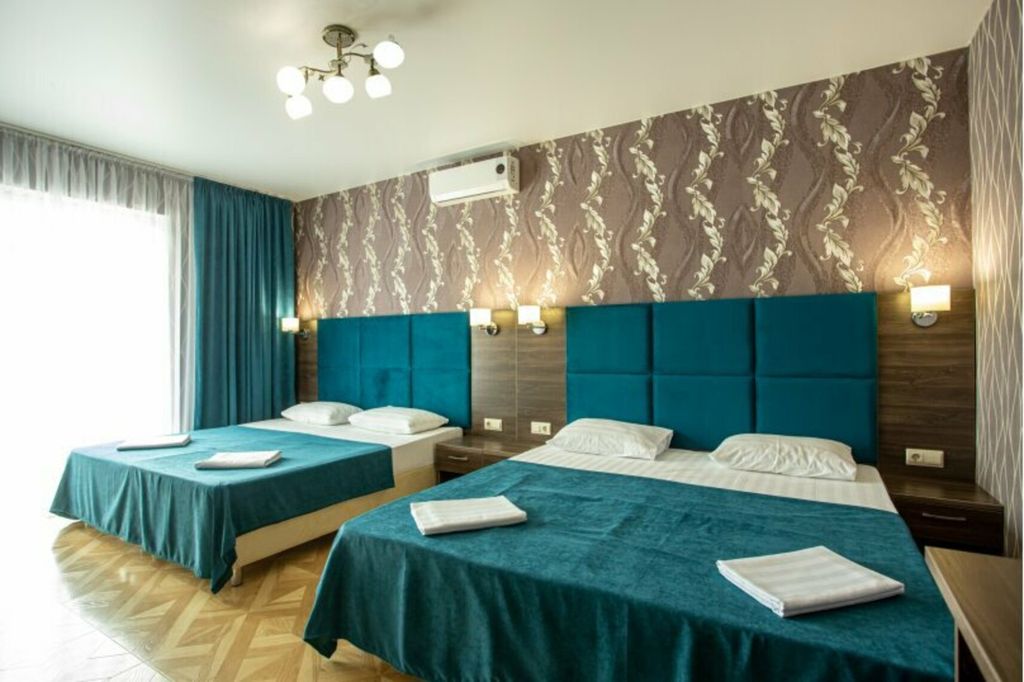 Атмосфера — Четырёхместный номер стандарт