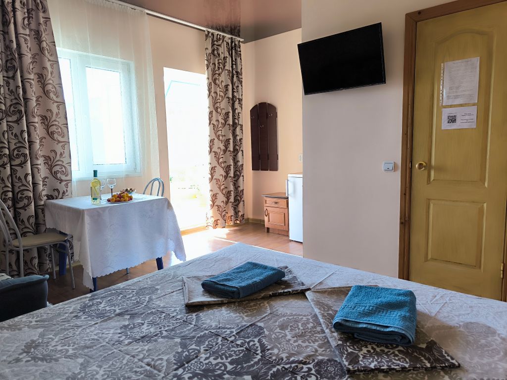 Оазис — Трёхместный номер улучшенный