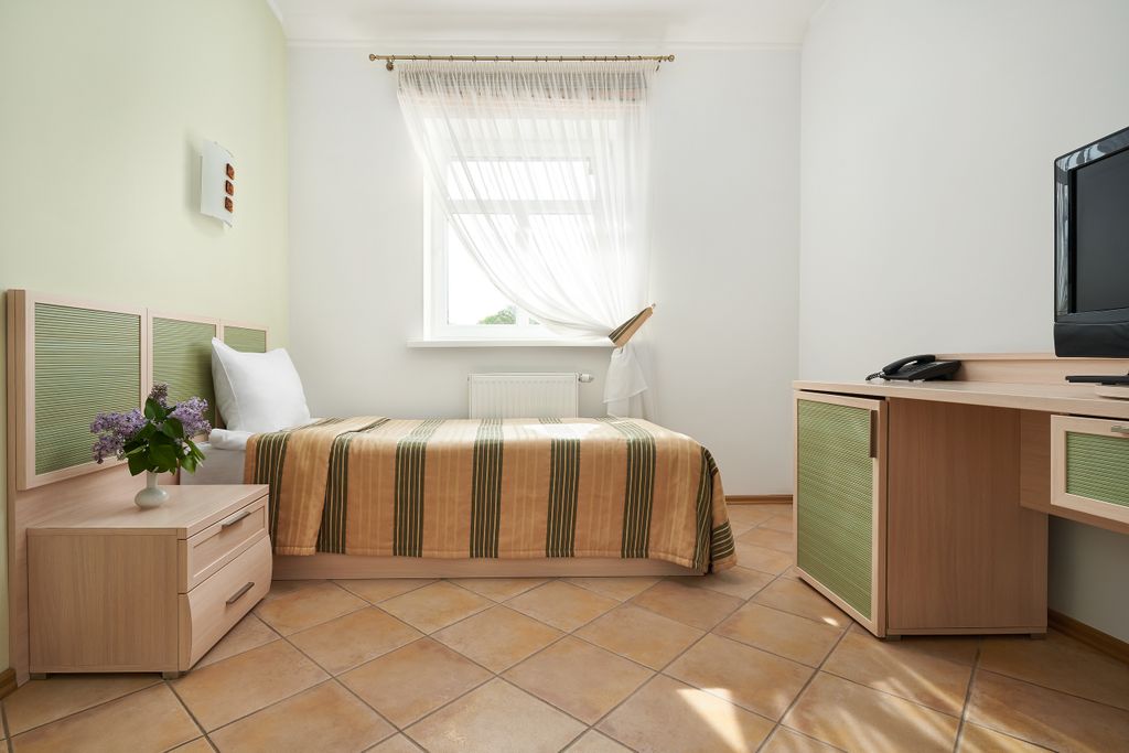 Беккер — Одноместный номер с односпальной кроватью и собственной ванной комнатой