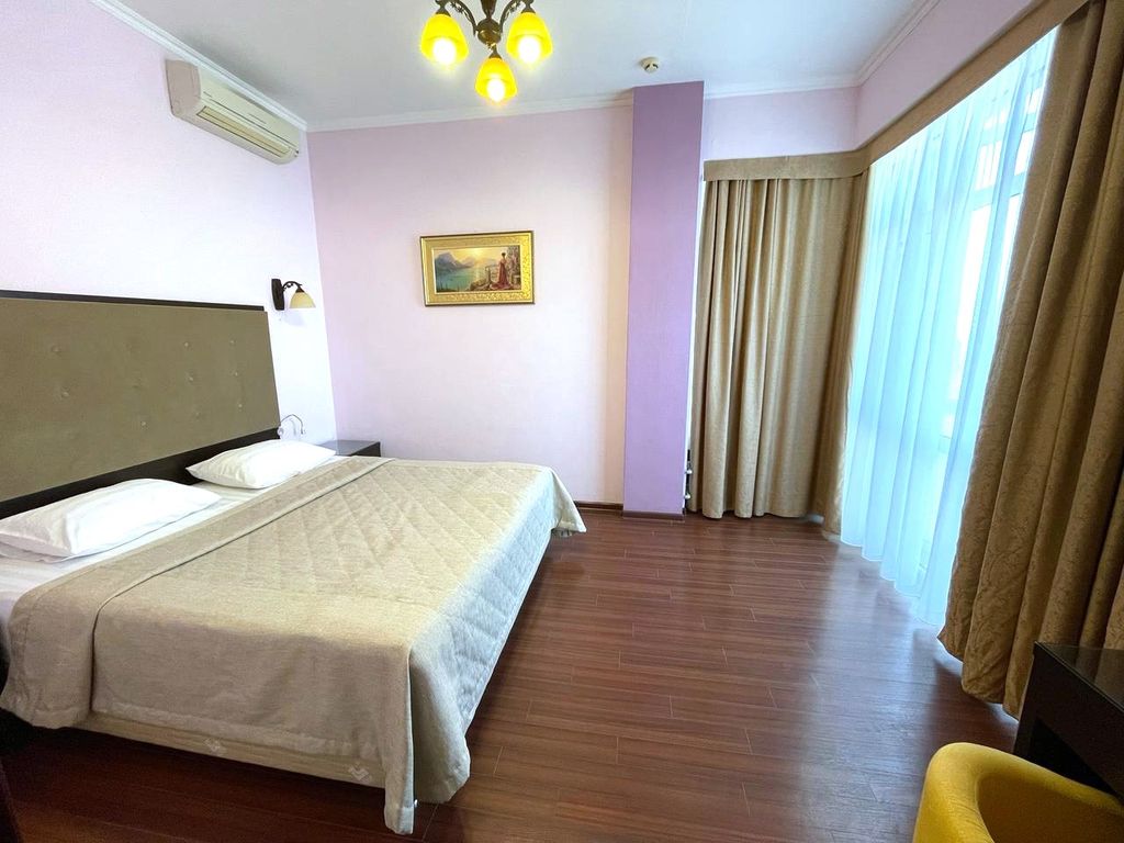 ЕврАзия — Апартаменты люкс с видом на море