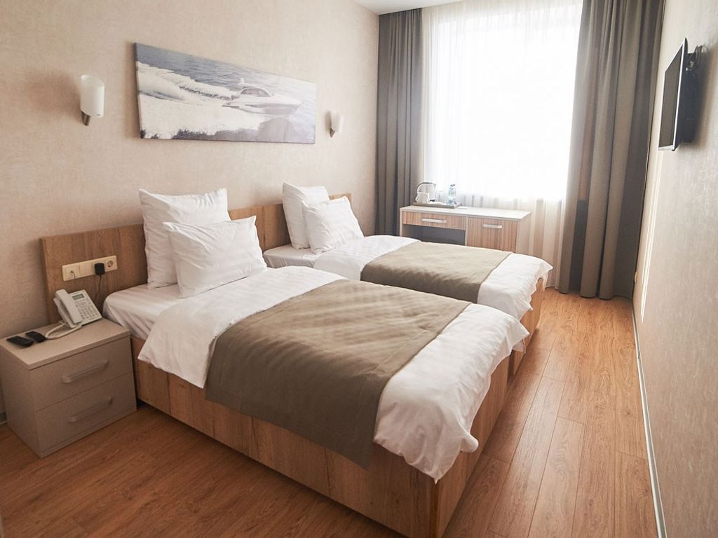 F911 — Двухместный номер с 2 отдельными кроватями стандарт с видом на море