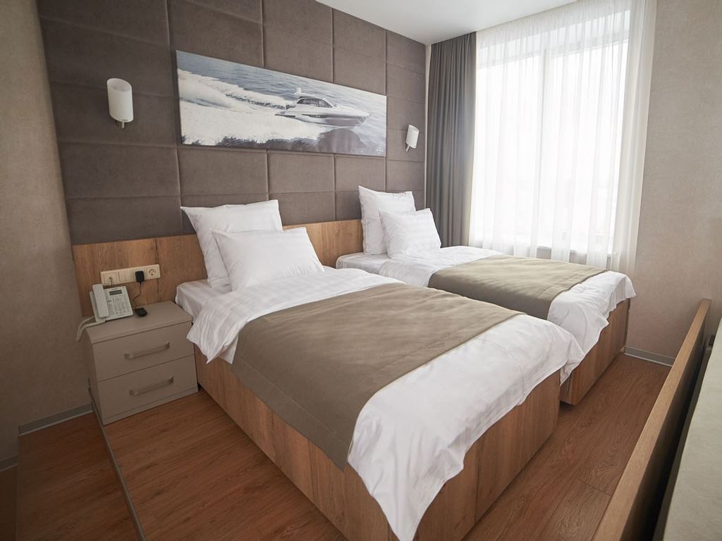 F911 — Двухместный номер с 2 отдельными кроватями улучшенный с видом на море