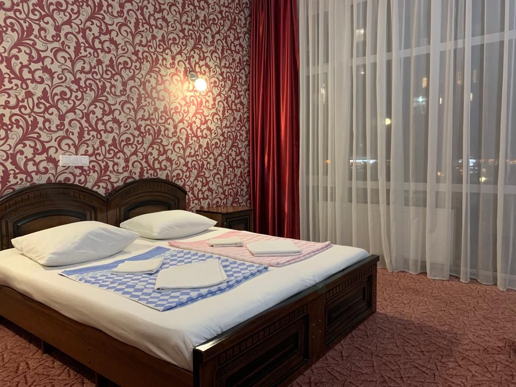 Георгий — Двухместный номер с 2 отдельными кроватями улучшенный