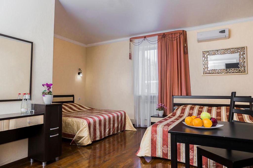 Виктория — Двухместный номер с 2 отдельными кроватями улучшенный