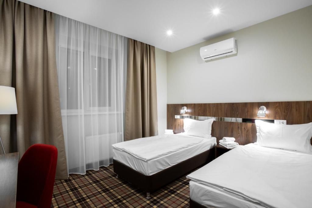 Альбион — Двухместный номер с 2 отдельными кроватями стандарт