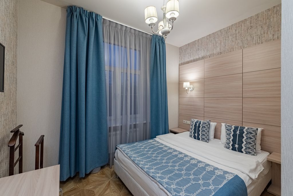 Дюжина — Четырёхместный номер Люкс Бизнес