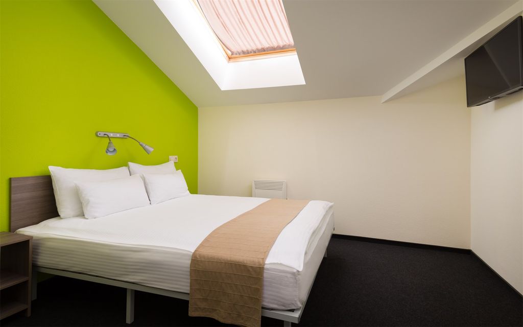 Станция L1 — Двухместный номер с 1 кроватью или 2 раздельными стандартный с мансардным окном