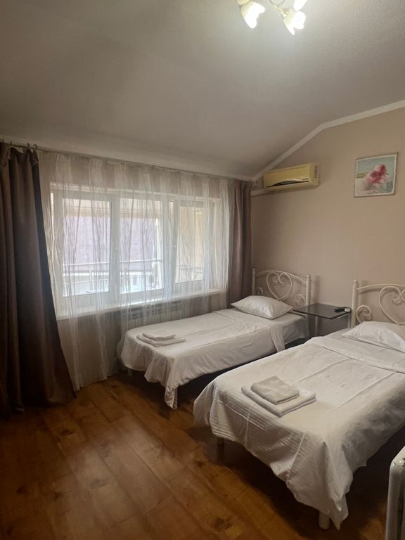 На Виноградной — Двухместный номер с 2 отдельными кроватями 2х местная студия с балконом и кух.зоной