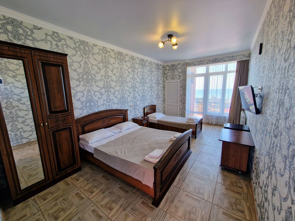 Аида — Трёхместный номер люкс с видом на море