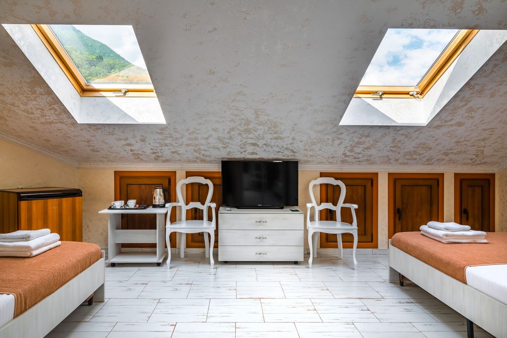 Вальс цветов Редэнс — Четырёхместный номер делюкс с мансардой