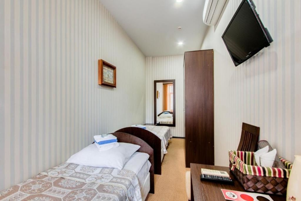 Апельсин на Тверской — Двухместный номер с 2 отдельными кроватями эконом