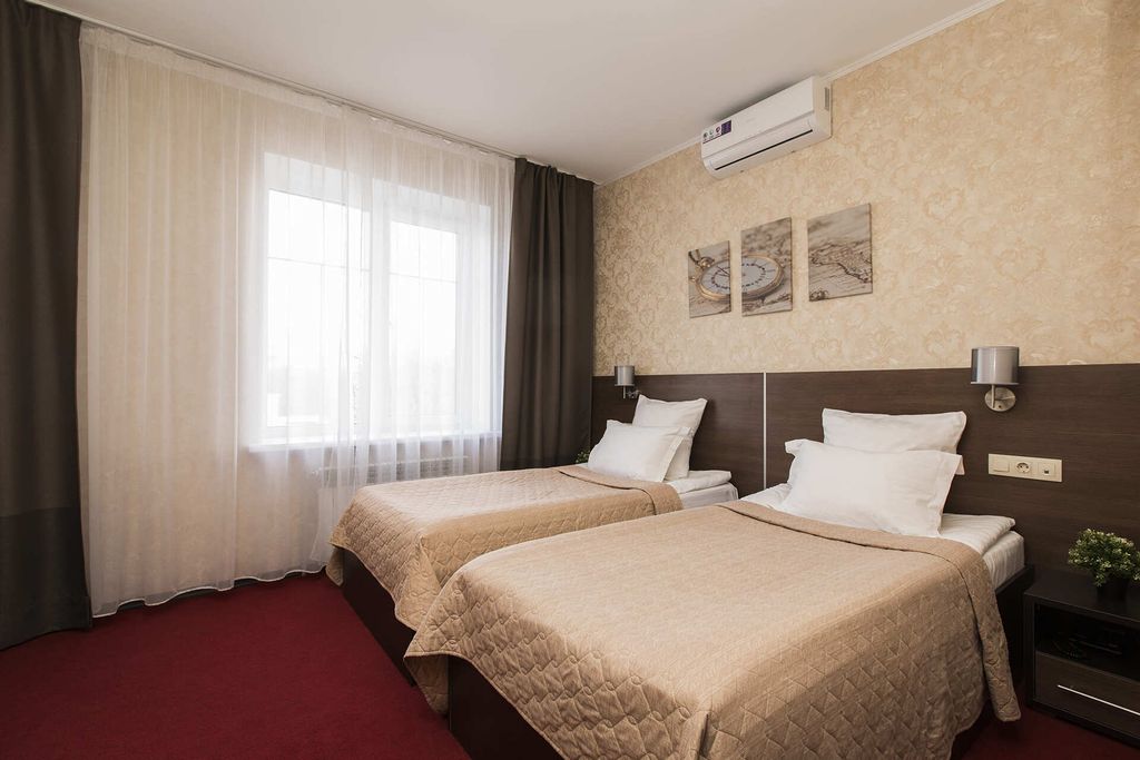 Премьер — Двухместный номер с 2 отдельными кроватями стандарт