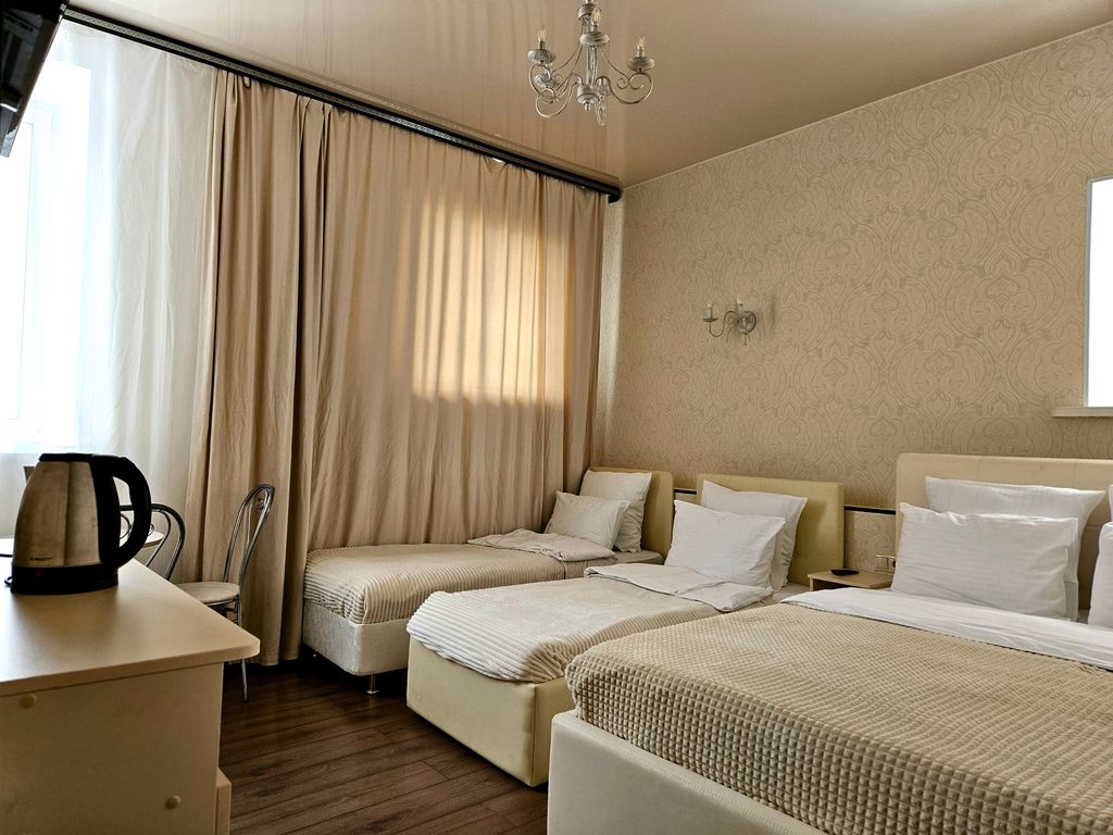 Бута — Четырёхместный номер улучшенный