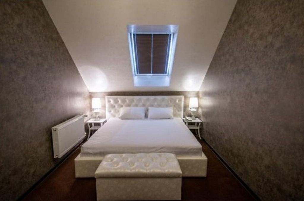 Шертон — Четырёхместный номер люкс с балконом