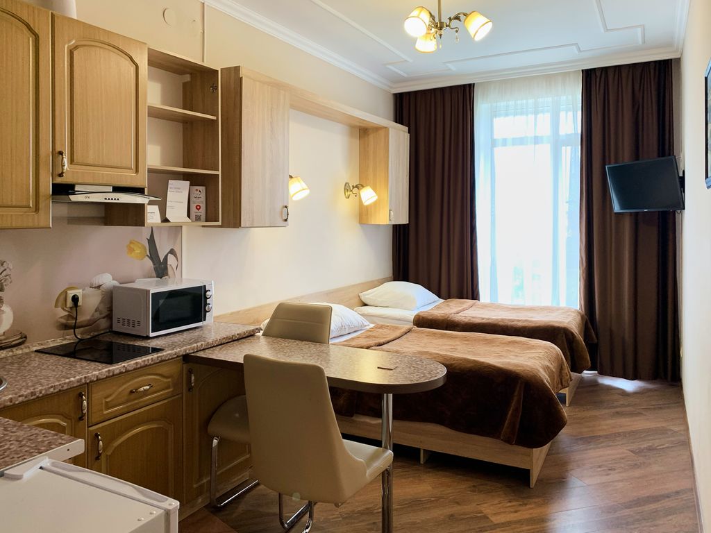 Calypso — Двухместный номер с 2 отдельными кроватями Студия с кухней, раздельными кроватями, душем (с завтраком)