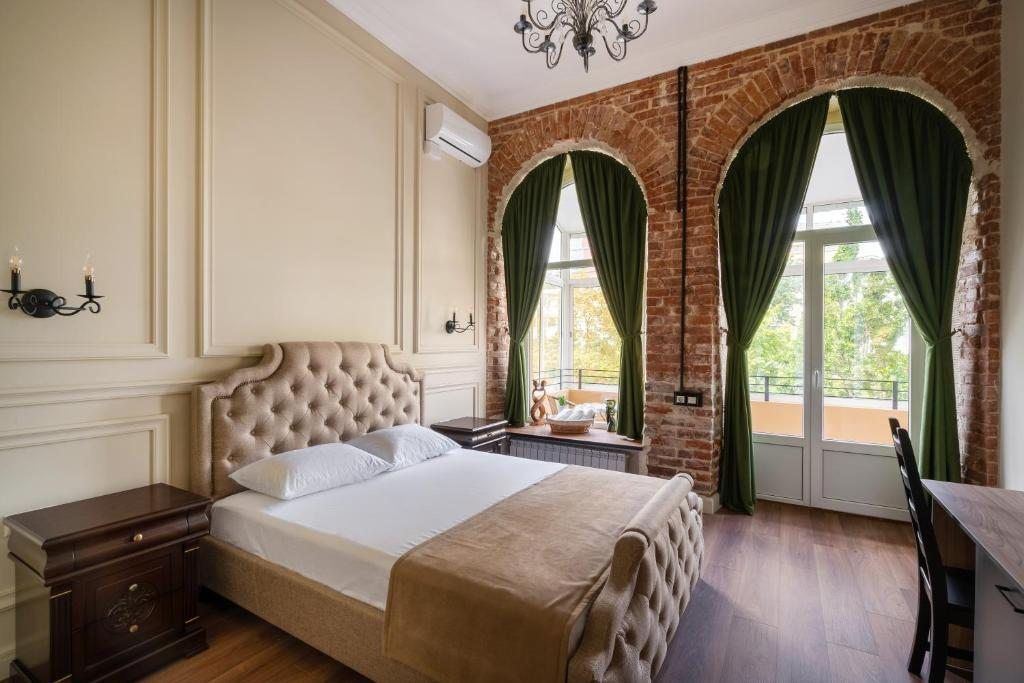 Дубровский — Двухместный номер с 1 кроватью Люкс с кроватью размера «king-size» и балконом