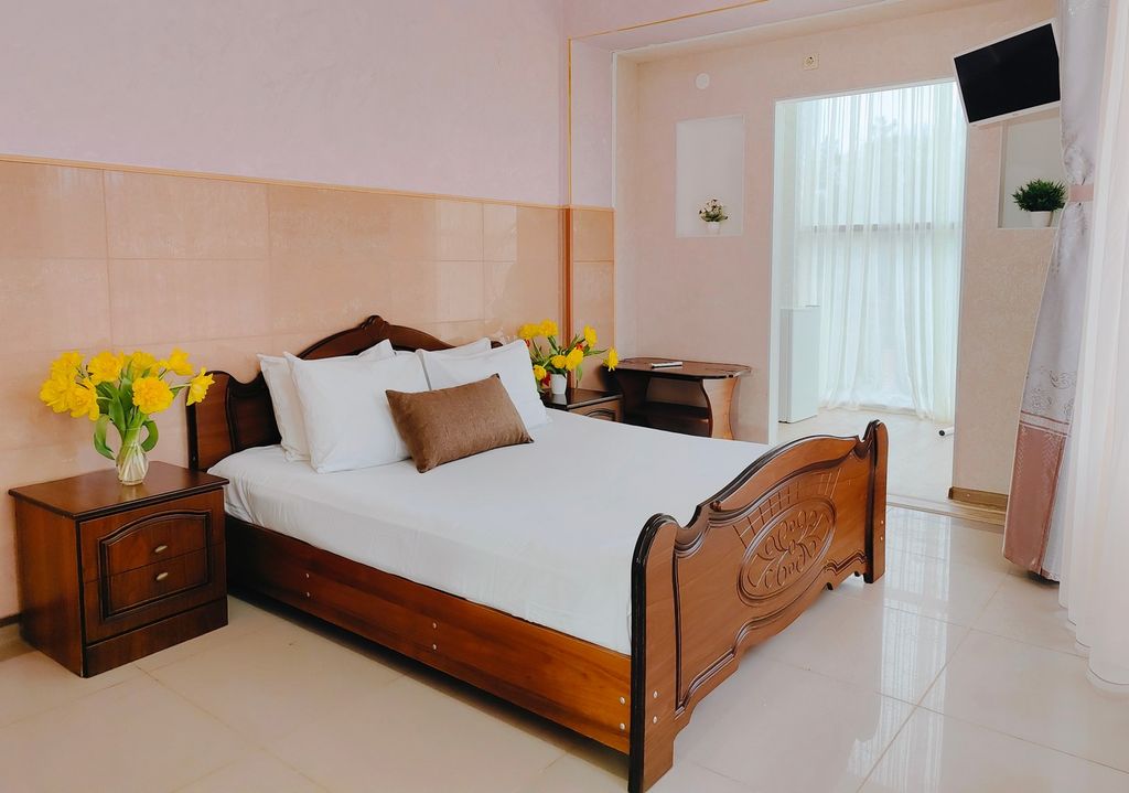 ЭрГес — Четырёхместный номер полулюкс с панорамным видом на колесо обозрения