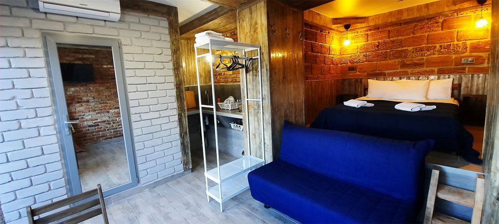 Ферма солнца — Четырёхместный номер студия с видом на сад