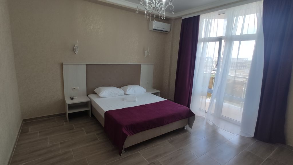 Акрос — Четырёхместный номер люкс