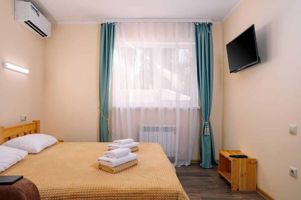 Лотос — Двухместный номер с 2 отдельными кроватями стандарт