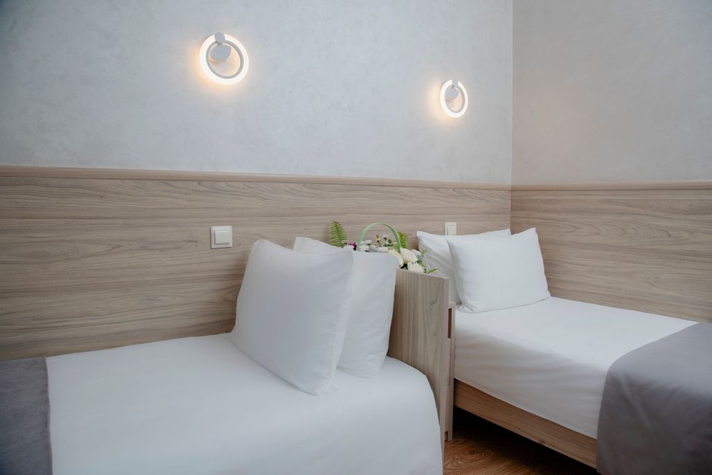 Бирюза — Двухместный номер с 2 отдельными кроватями стандарт с балконом