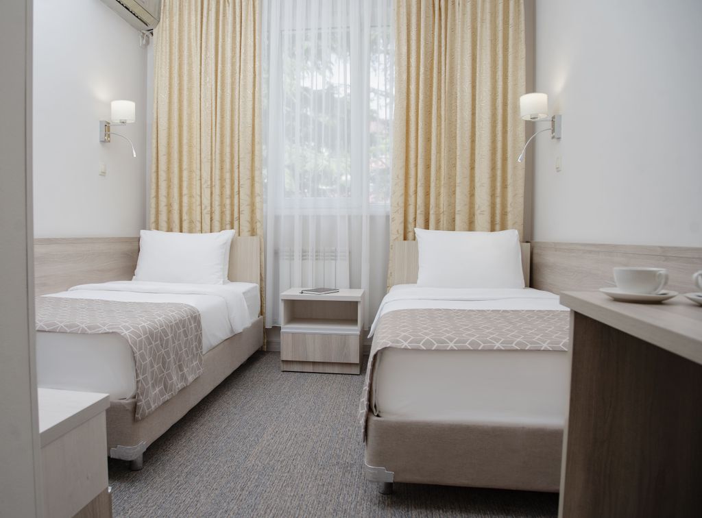 Бирюза — Двухместный номер с 2 отдельными кроватями стандарт без балкона