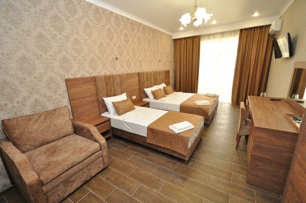 Манэ — Трёхместный номер делюкс