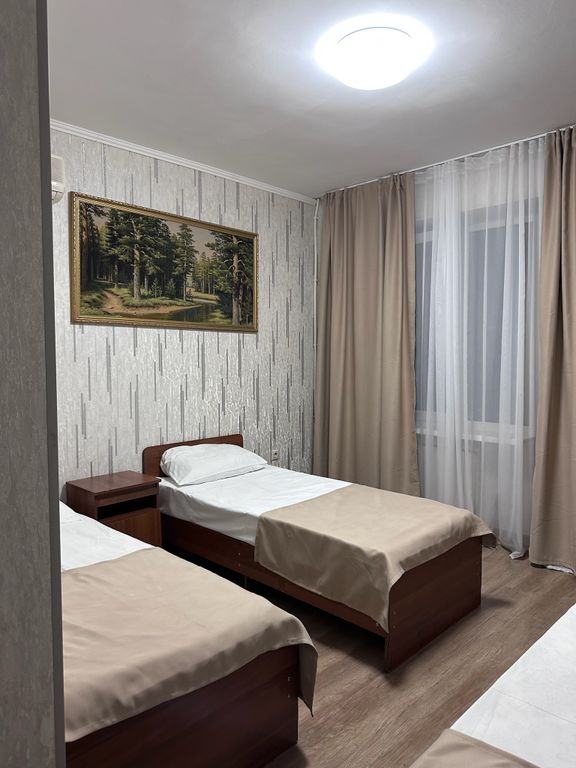 Ника — Трёхместный номер с балконом