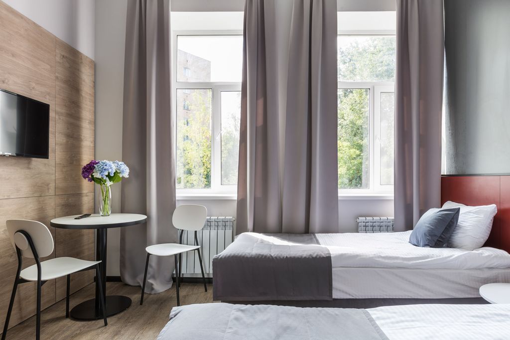 Greenfeel Смоленск — Двухместный номер с 2 отдельными кроватями улучшенный с двуспальной или двумя односпальными кроватями и мини-кухней