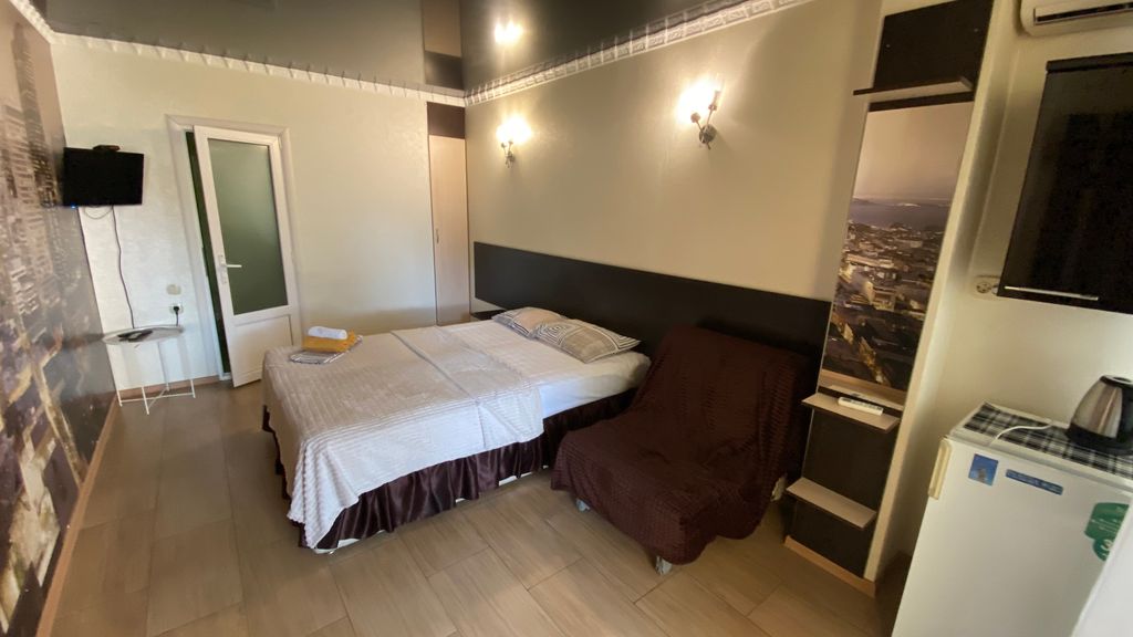 Кокос — Трёхместный номер улучшенный на террасе