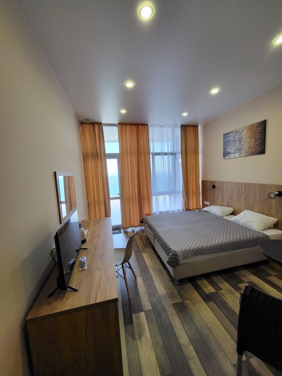 Маунтин Эйр — Трёхместный номер улучшенный с видом на море