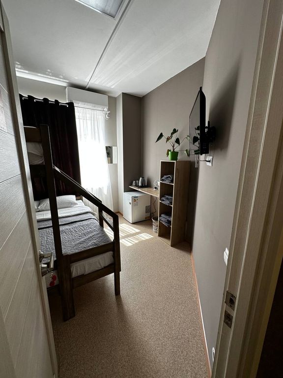 Маяк — Трёхместный номер улучшенный с двухъярусной кроватью