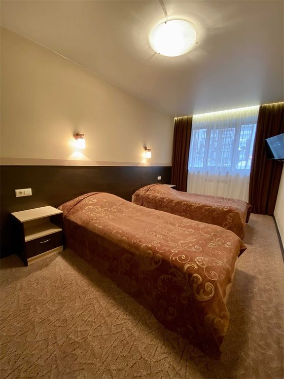 Рыбинск — Двухместный номер с 2 отдельными кроватями Семейный двухкомнатный (две односпальные кровати +диван)