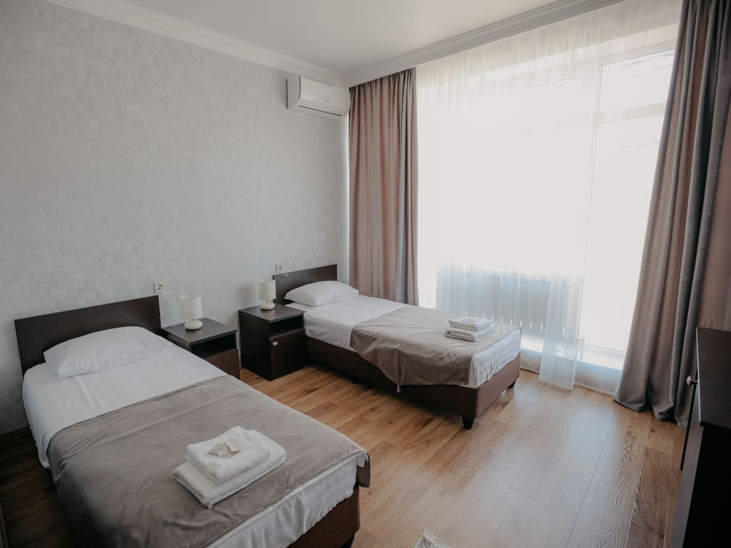 Феникс — Двухместный номер с 2 отдельными кроватями стандарт