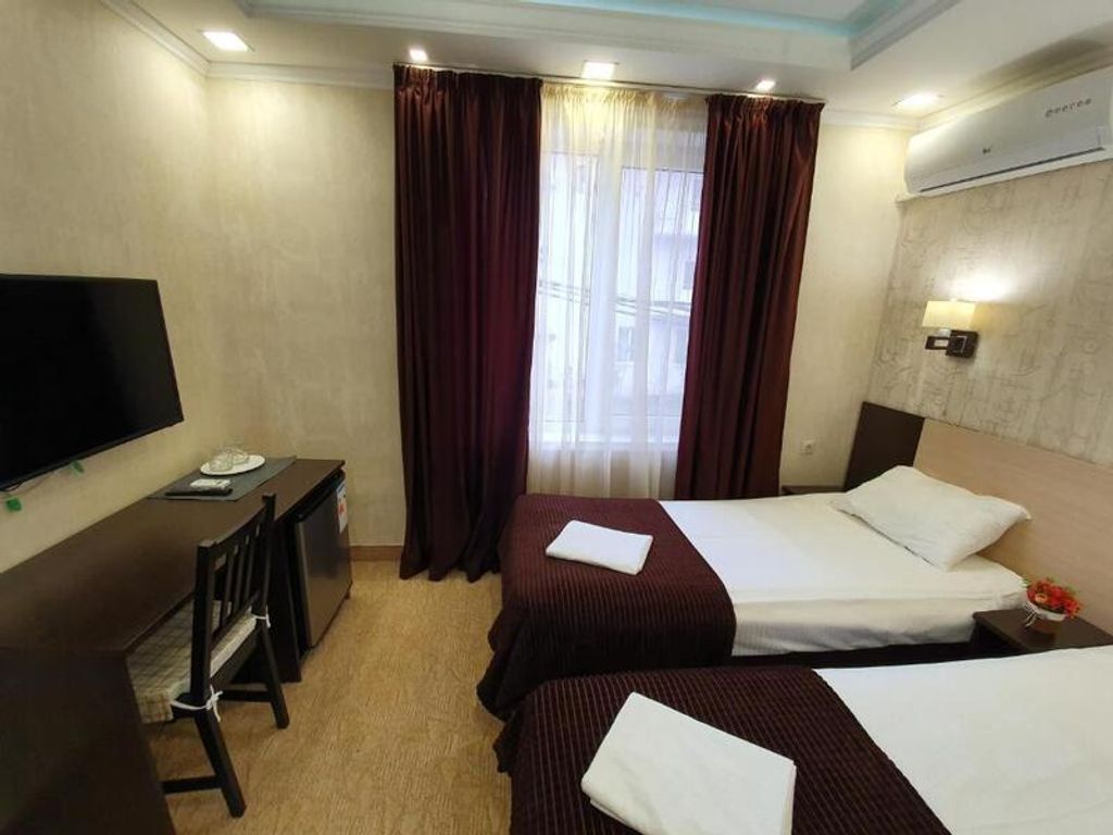 Восток — Двухместный номер с 2 отдельными кроватями Эконом-класса