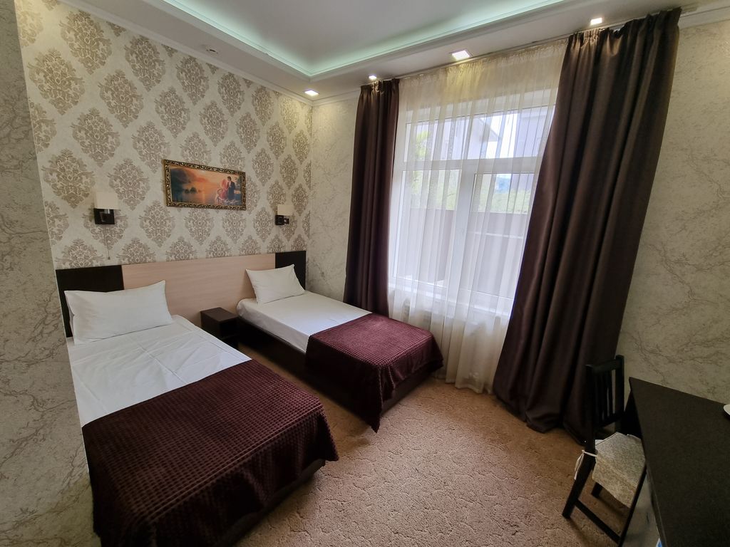 Восток — Двухместный номер с 2 отдельными кроватями стандарт
