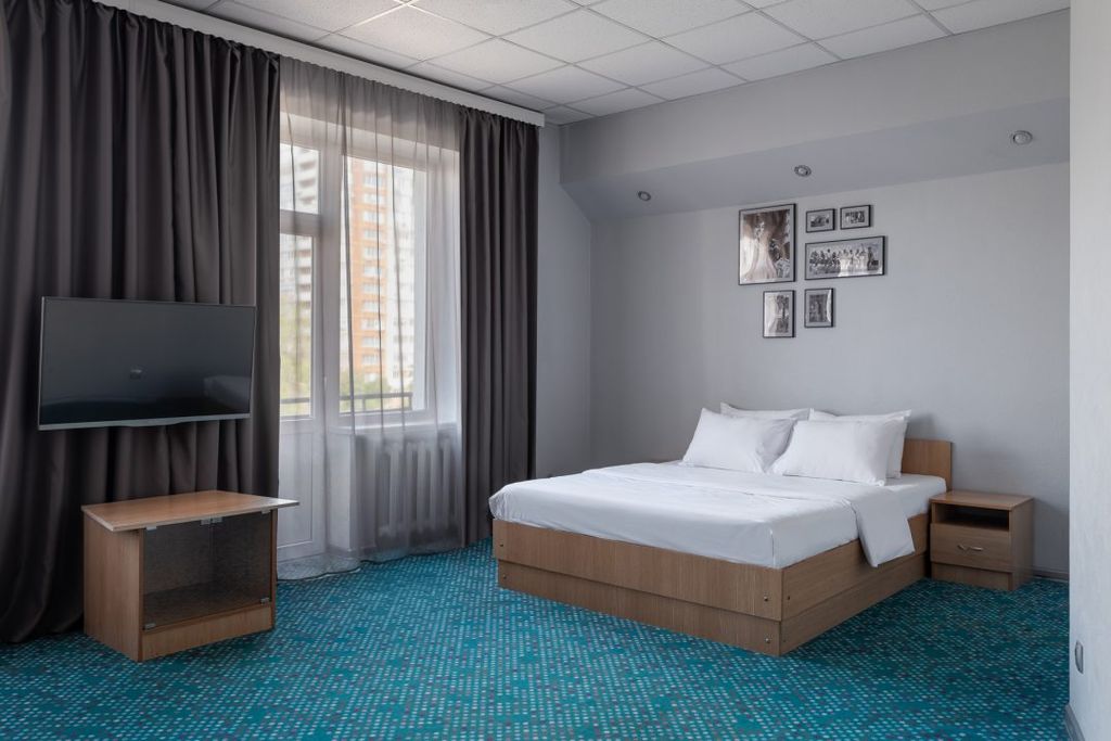 Marins Ростов-на-Дону — Четырёхместный номер стандарт четырехместный с двуспальной и двумя односпальными кроватями