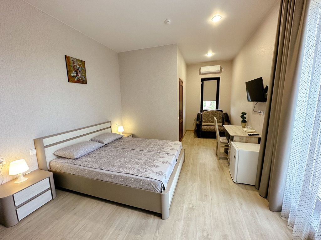 Капитан — Трёхместный номер люкс с видом на море