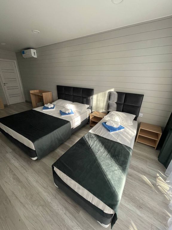 Притяжение — Трёхместный номер улучшенный с видом на море