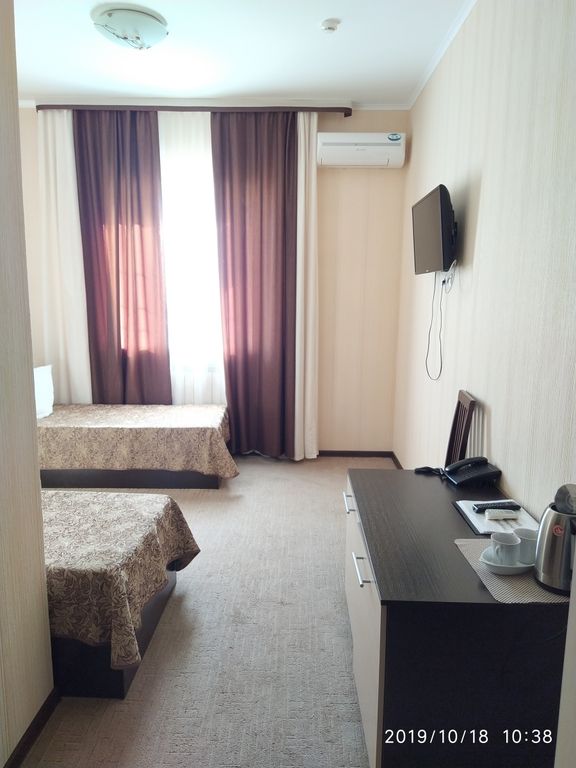 Бриз — Двухместный номер с 2 отдельными кроватями стандарт