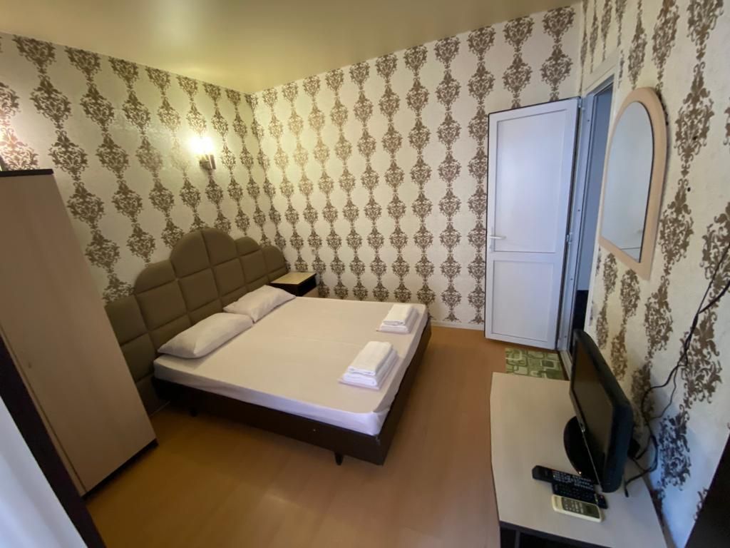 Афродита — Двухместный номер с 2 отдельными кроватями или 1 двухспальной