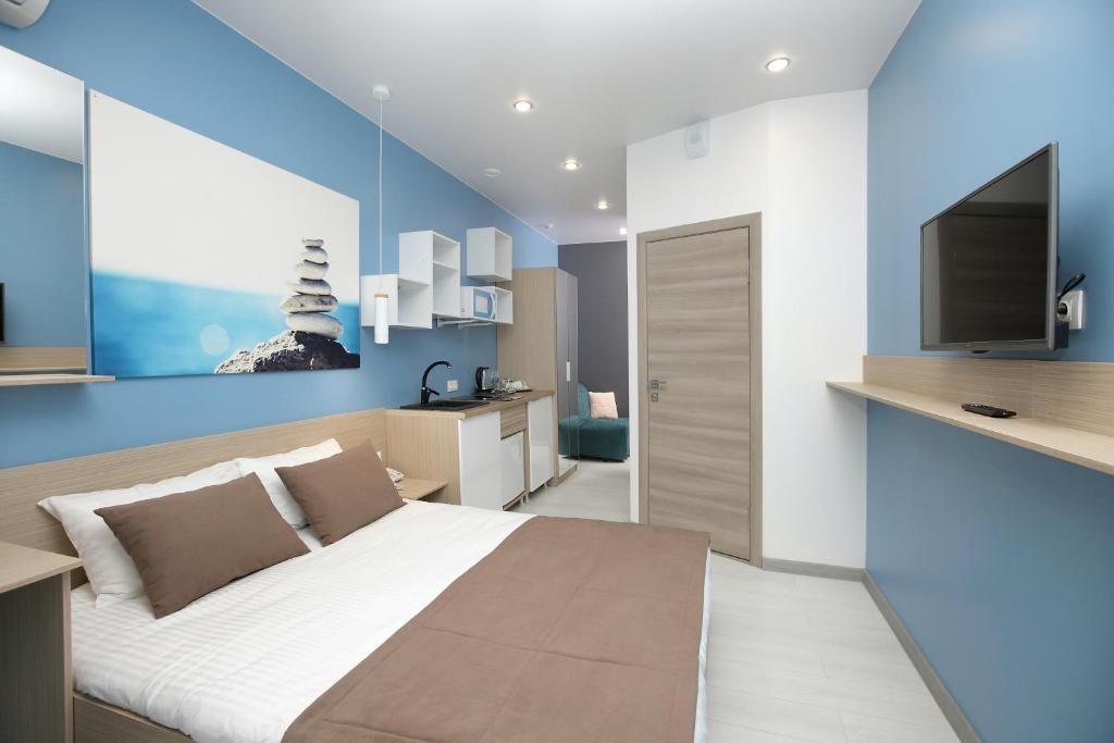 Радуга — Трёхместный номер с кухней и балконом