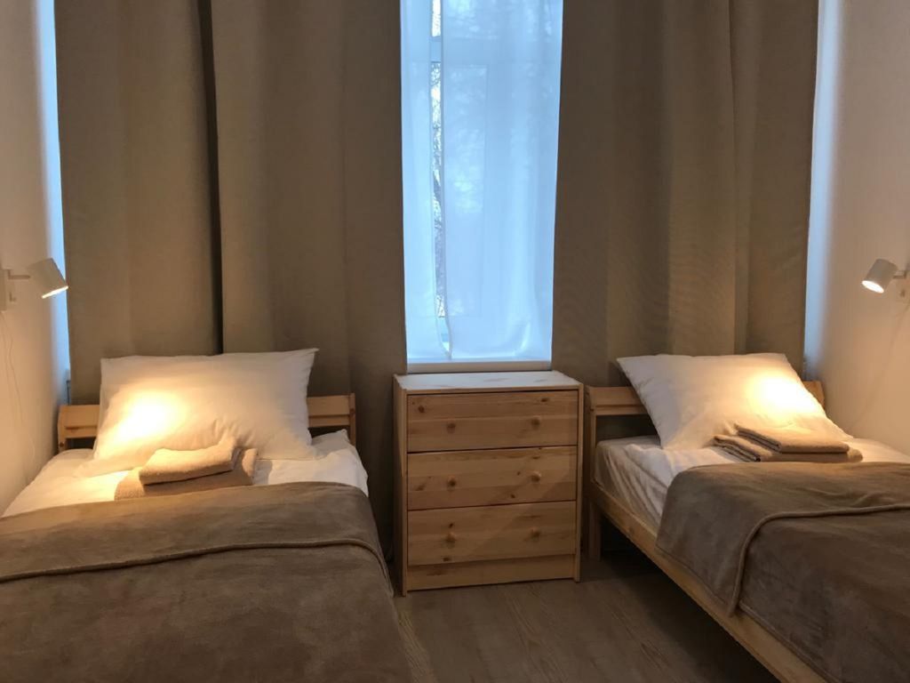 Стокгольм — Двухместный номер с 2 отдельными кроватями и общим санузлом