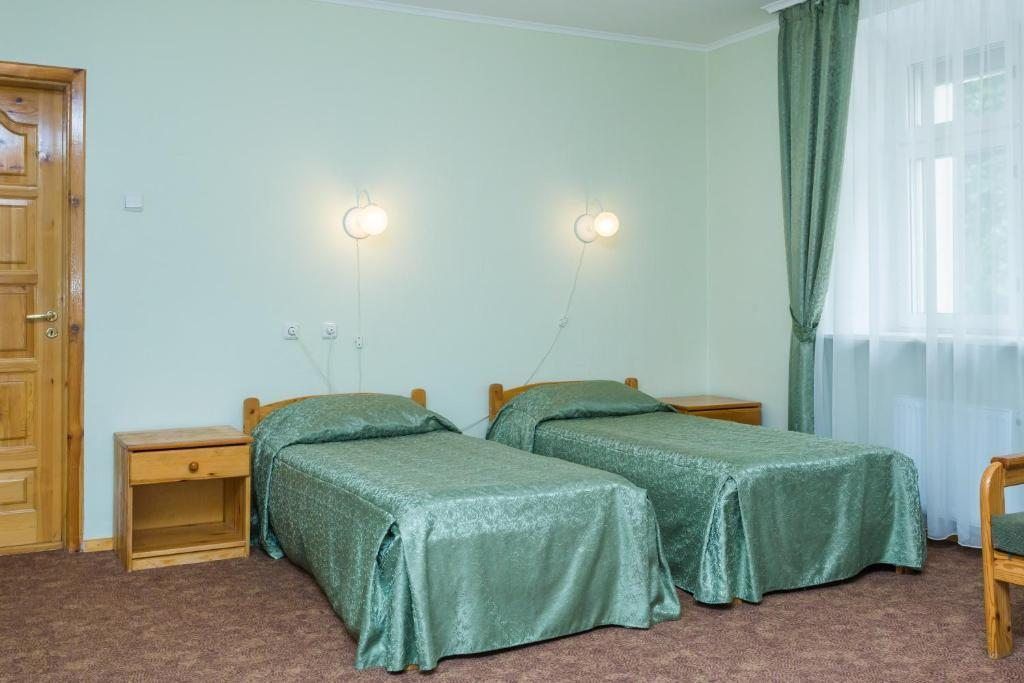 Эдем — Двухместный номер с 2 отдельными кроватями стандарт однокомнатный