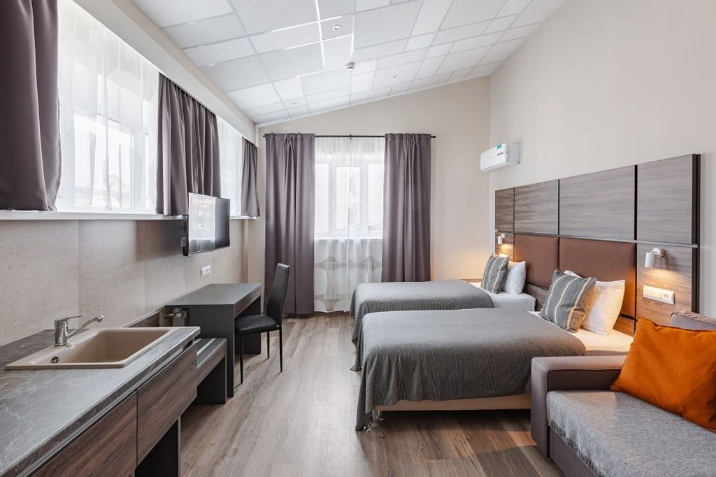 Фурор — Двухместный номер с 2 отдельными кроватями студия люкс