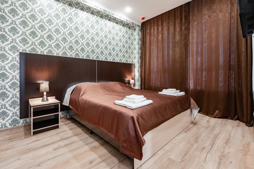 Премьер-Ростов — Четырёхместный номер комфорт 2-х комнатный с одной кроватью