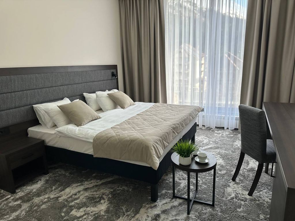 Горский Дом — Четырёхместный номер делюкс с панорамным видом