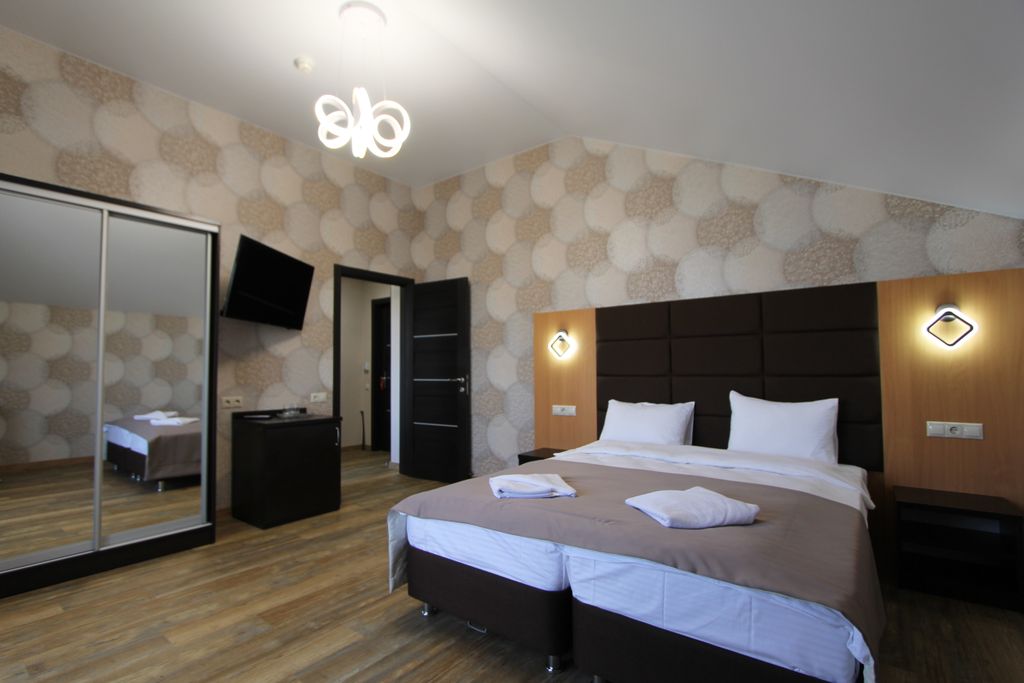 Страна магнолий — Четырёхместный номер люкс с видом на горы