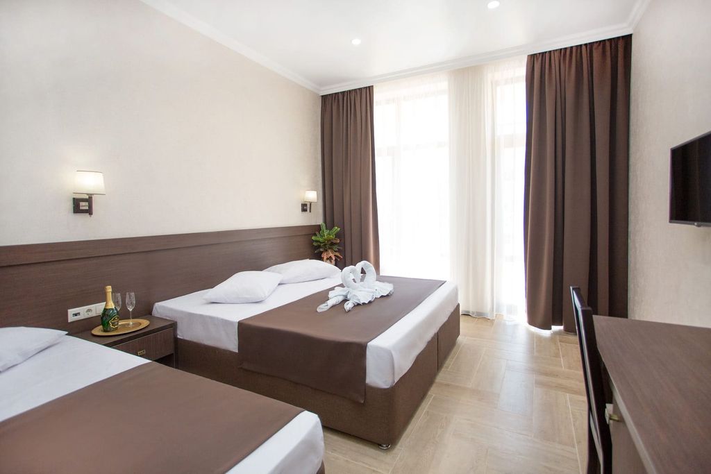 Coral — Трёхместный номер с видом на море